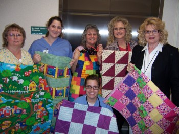 Winona Area Quilters Guild FBC baby quilts 3-21-2012 001