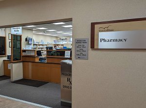 Community Report 2023 8 Clinic Pharmacy Sign Hours Store Web