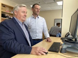 Norgard Millis at computer web